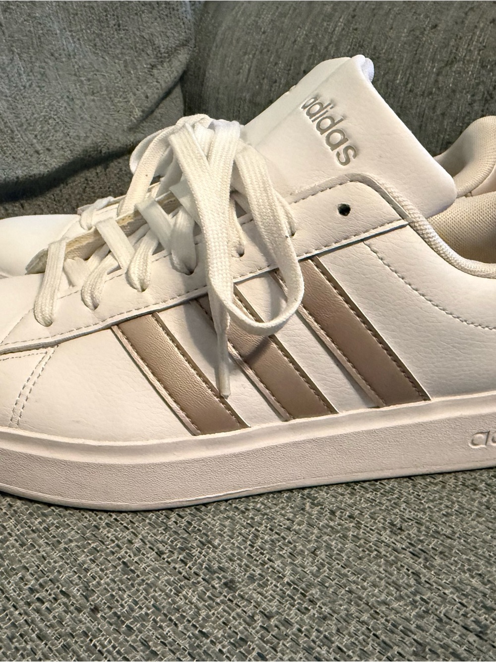 adidas Women’s White Sneakers with Metallic Rose Gold Stripes